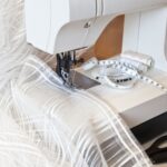 sewing curtains on a typewriter