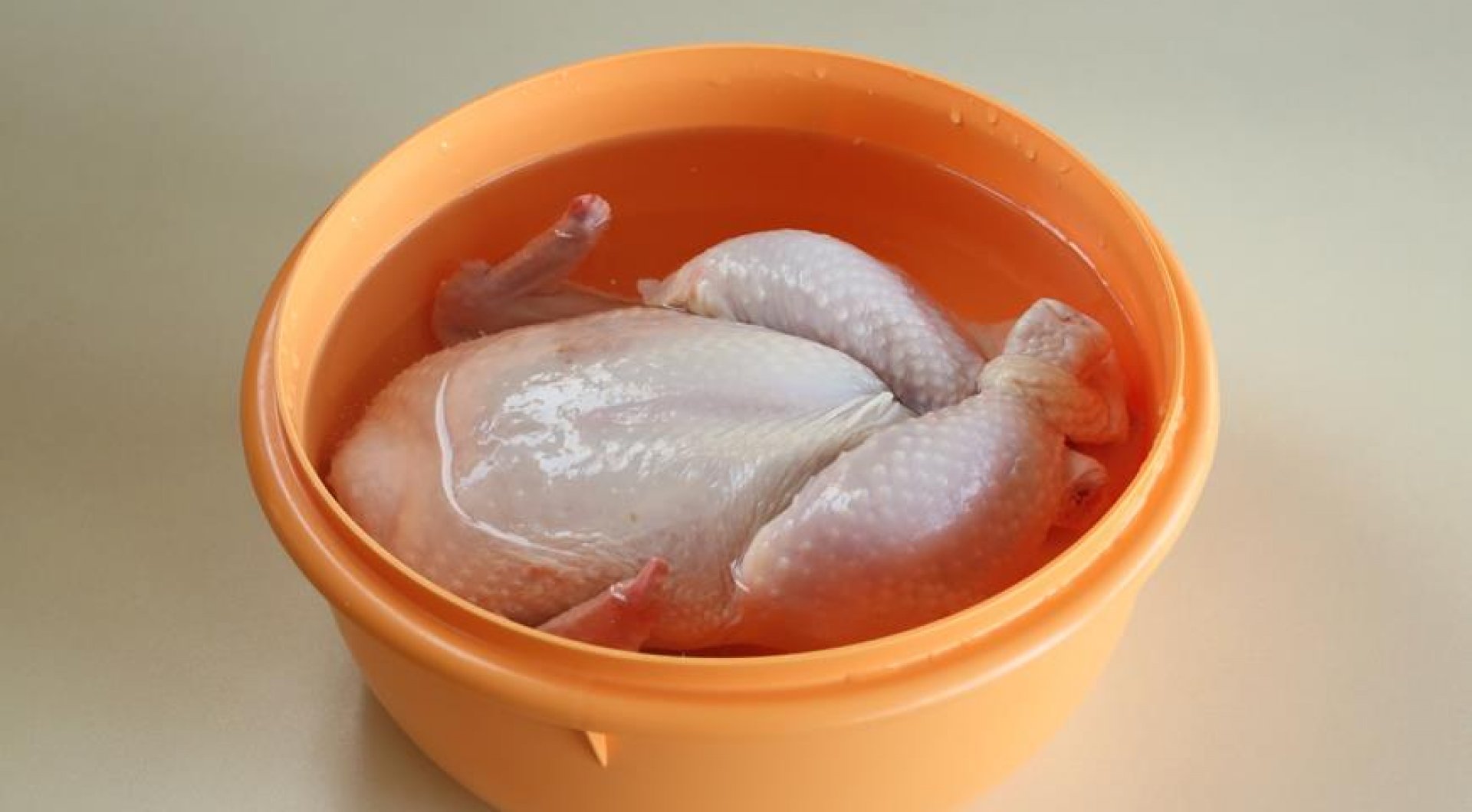 how to defrost chicken in water