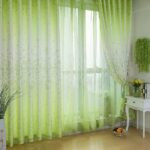 green wallpaper and curtains