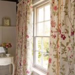 cornice under beige colorful curtains