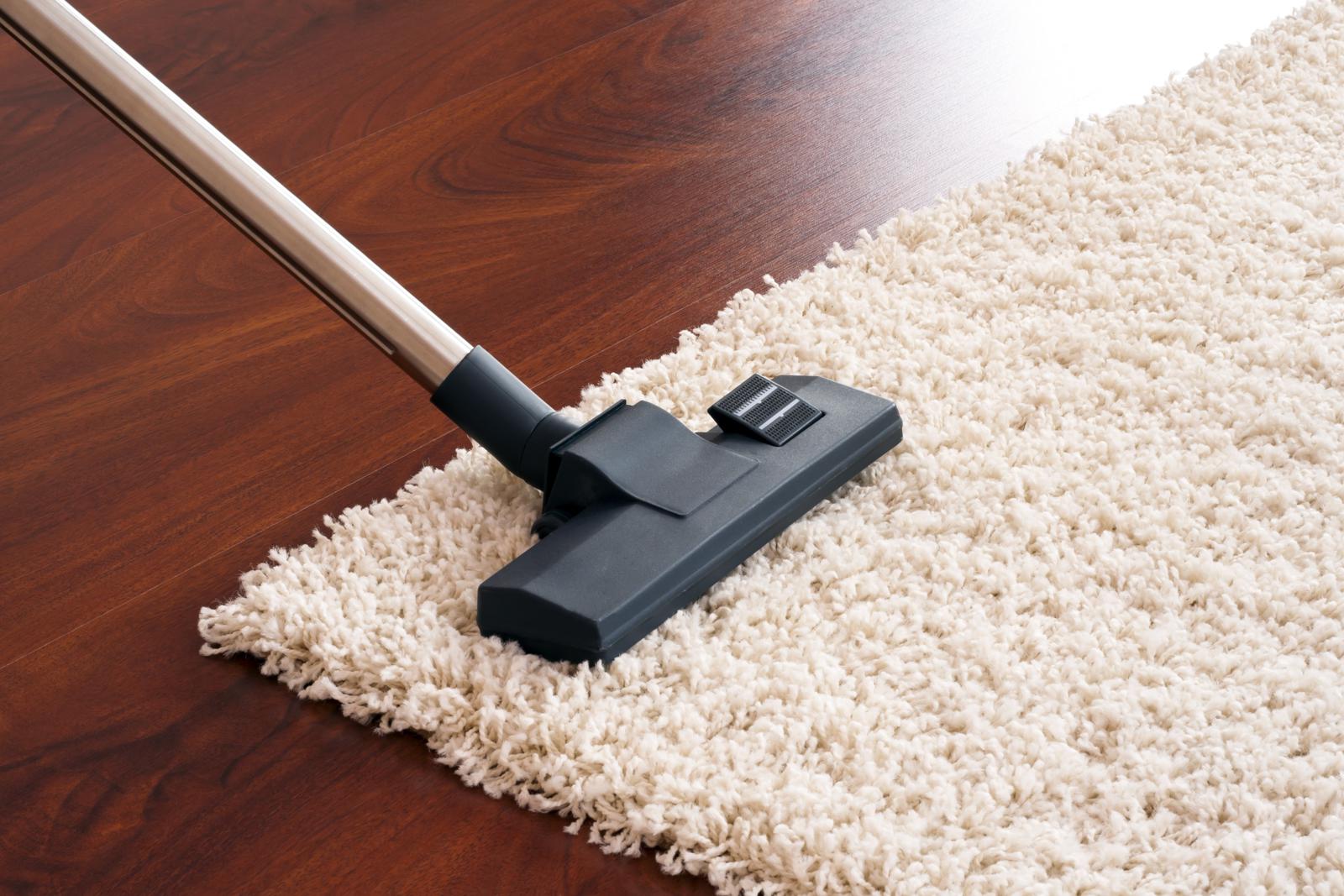 vacuuming carpet