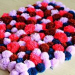 pom-pom rug decoration