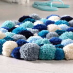 rug from pom-poms photo decoration