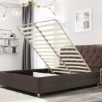 bed with lifting mechanism in the bedroom