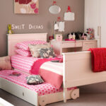 bed for a teenager in a pink interior