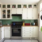 kitchen cabinets partially glazed to the ceiling