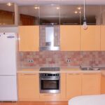 kitchen cabinets mirrored to the ceiling