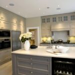 kitchen cabinets up to the ceiling with island