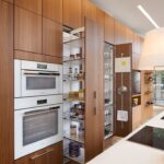 kitchen cabinets to the ceiling with pull-out