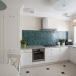 kitchen cabinets up to the ceiling with extractor hood