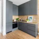 kitchen cabinets up to the ceiling gray corner