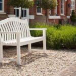 white bench in the garden