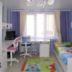 nursery with purple curtains