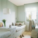 nursery with striped wallpaper