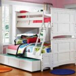 nursery with a white bunk bed