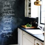 chalk board in the kitchen with a list