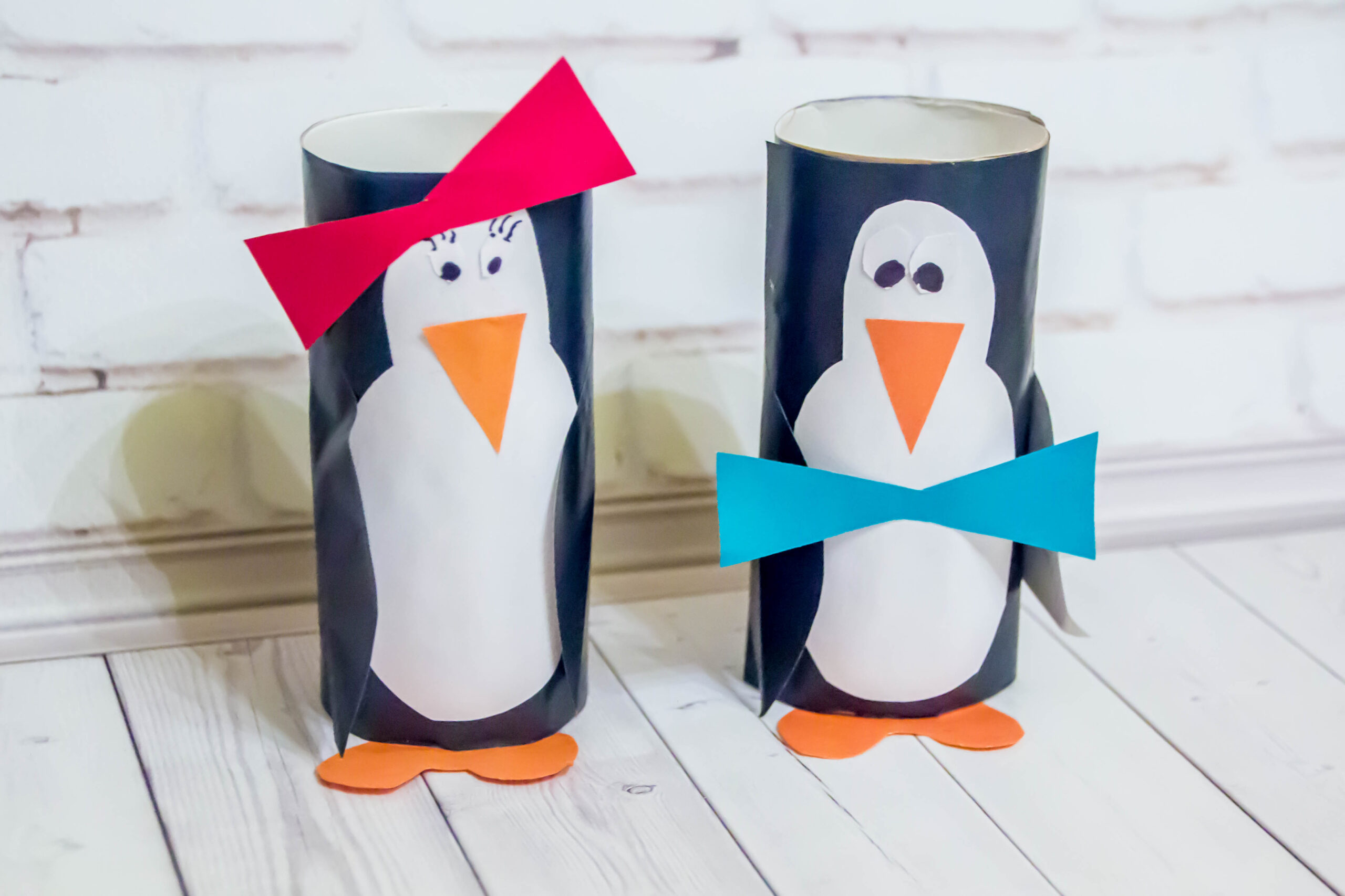 stand made of cardboard penguin