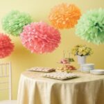 large napkin pom poms over the table