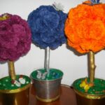 pom poms from napkins in pots