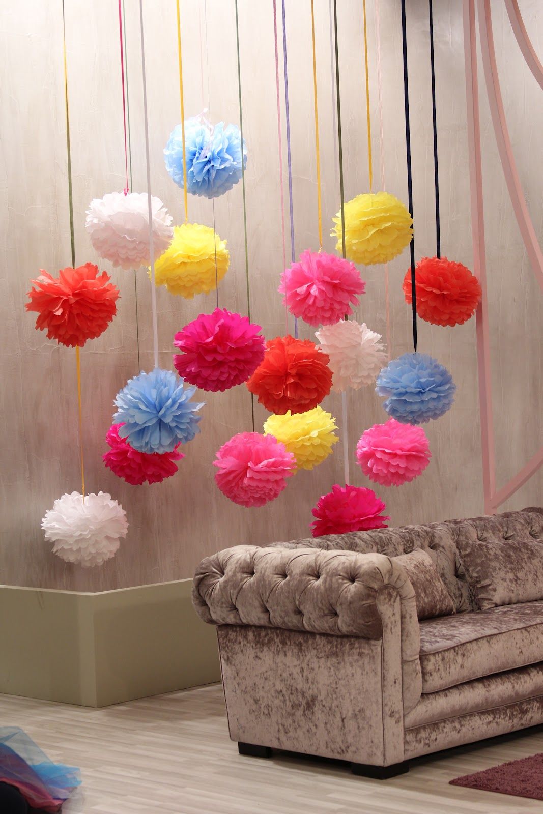 pom-poms hanging on a ribbon