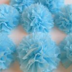 napkin pom-poms lie blue