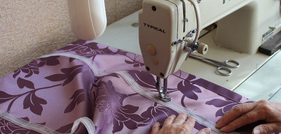 sewing curtains on a typewriter