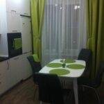 green curtains in the kitchen