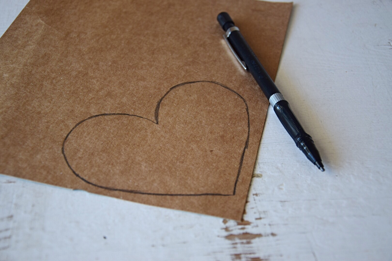 drawing hearts on cardboard