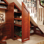 wooden cabinet under the stairs