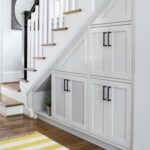 cabinet under the stairs with handles