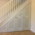 small wardrobe under the stairs