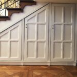 three-door wardrobe under the stairs