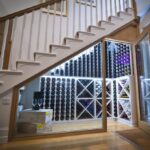 glass cabinet under the stairs