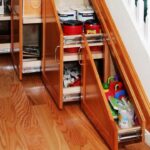 wooden pull-out wardrobe under the stairs