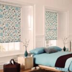 curtains to the window sill in the bedroom design photo