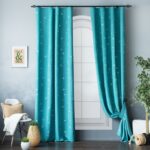 turquoise curtains with blue wallpaper