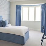 blue curtains in the bedroom