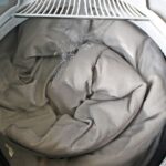 washing blankets in a washing machine photo