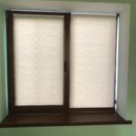 roller blinds on a brown window