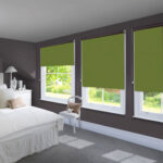 roller blinds green in the bedroom