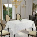 white tablecloth with chairs