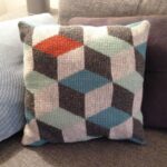 tunisian knit pillow in rhombuses