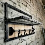 black wall hanger with hooks