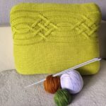 mustard knitting pillow