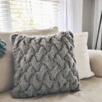 pillow on knitting needles gray with convex pattern