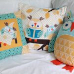 decorative pillow with owls in the bedroom