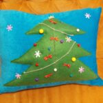 decorative pillow with a Christmas tree