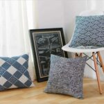 de gray patterned pillow