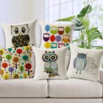 decorative pillow with a gray owl