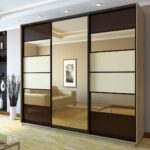 brown wardrobe with mirror